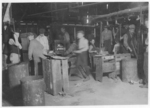 Lewis Hine child labor: Day scene. Wheaton Glass Works, Millville, N.J. This is typical of night shifts. Location: Millville, New Jersey.