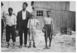 Lewis Hine child labor: In the Alexandria glass factories, negroes work side by side with the white workers. Also in Richmond. These are some of those working in Alexandria (Va.) Glass Factory. Location: Alexandria, Virginia.