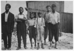 Lewis Hine child labor: In the Alexandria glass factories, negroes work side by side with the white workers. Also in Richmond. These are some of those working in the Alexandria (Va.) Glass Factory. Location: Alexandria, Virginia.