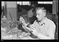 Lewis Hine: blowing chemical glassware Lewis Hine: blowing chemical glassware