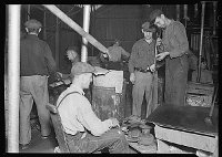 Lewis Hine: making glass bottles Lewis Hine: making glass bottles