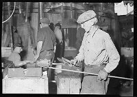 Lewis Hine: making glass bottles Lewis Hine: making glass bottles