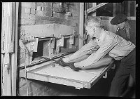 Lewis Hine: making glass bottles (gathering) Lewis Hine: making glass bottles (gathering)