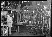 Lewis Hine: man inspecting machine-blown bottles Lewis Hine: man inspecting machine-blown bottles