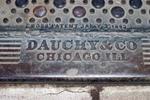 Closeup of Dauchy & Company embossing on ironwork