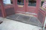 Dauchy & Company bullseye storefront stoop