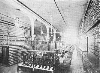 Interior of the store of N. B. Holden showing effect of Luxfer Prisms