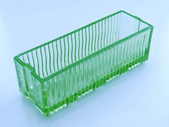 Green Vera-Lux glass brick · Bottom