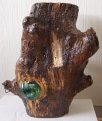 Cutter tree insulator embedded in tree trunk